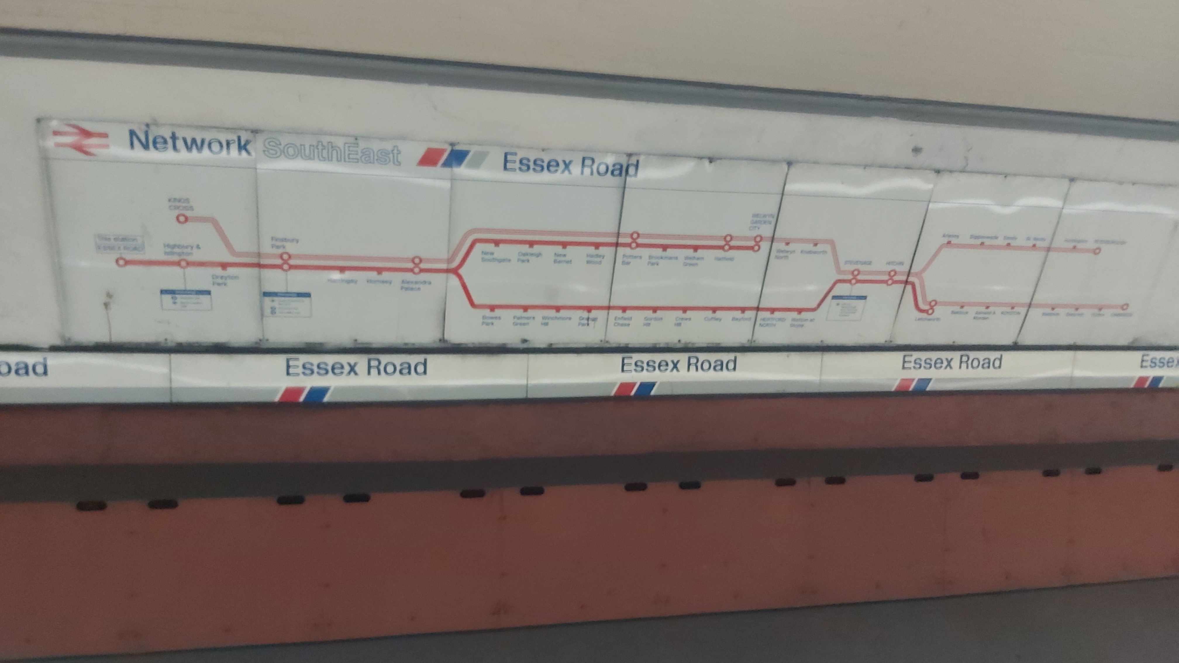 A Network SouthEast-era route map on the outside wall of the northbound platforms at Essex Road station.